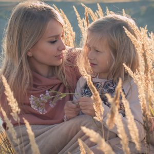 Mother and daughter posing