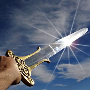 Light glowing on a sword