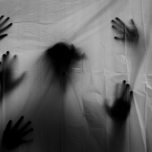 Ghosts behind white sheet