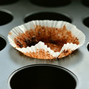 Used muffin paper left on muffin tray