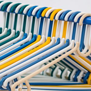 Hangers lined up on a rod